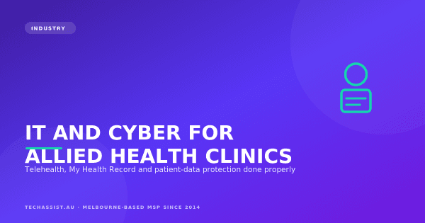 Allied health practitioner using cloud practice-management software on a secured laptop in a Melbourne clinic