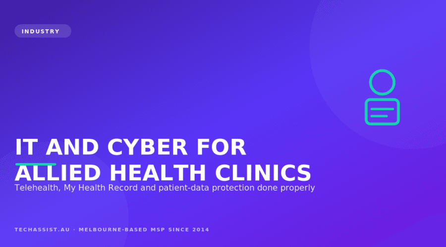 Allied health practitioner using cloud practice-management software on a secured laptop in a Melbourne clinic