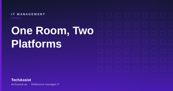 A boardroom with a video bar under a wall-mounted screen and a touch console on the table